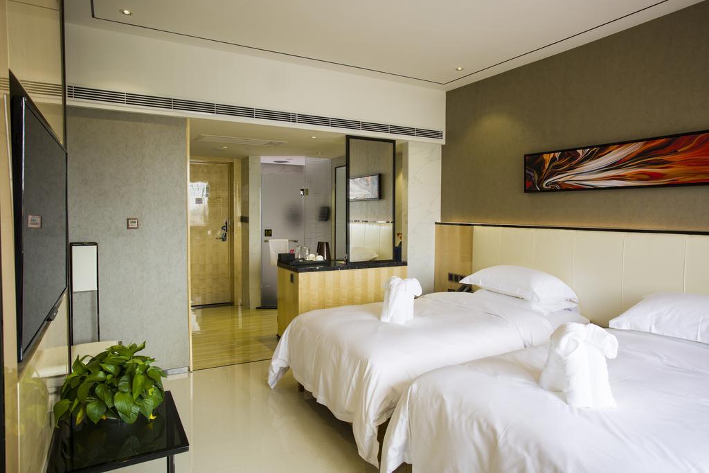 Lori Star Hotel Qionghai Ruang foto
