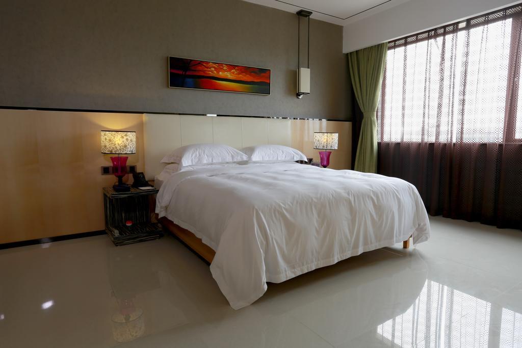 Lori Star Hotel Qionghai Ruang foto