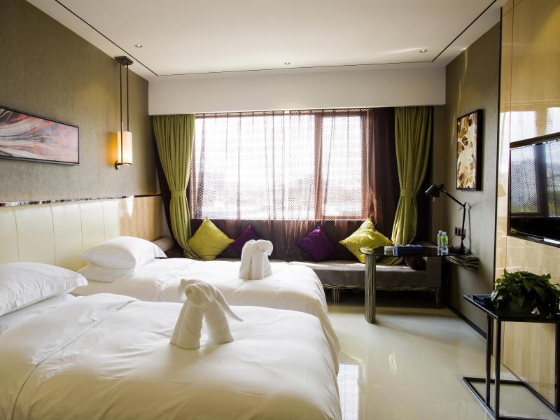 Lori Star Hotel Qionghai Bagian luar foto